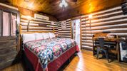 Bedroom of Cabin to Rent in AVL NC in the Blue Ridge Mountains Log Cabin Motor Court