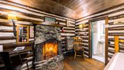 Fireplace in Cabin Rental for your next Asheville Vacation Accommodation at the Log Cabin Motor Court