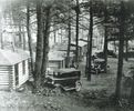 Historic black and white photo of the log cabin motor court vacation rentals