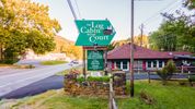 The Log Cabin Motor Court Entrance, Cabins for Rent in Asheville North Carolina